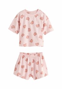 Ensemble composé d'un haut à manches courtes et d'un short roses avec une taille élastique, présentant un motif répétitif de petits visages d'ours en dessin animé.