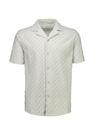 Chemise à manches courtes, boutonnée, de couleur blanc cassé avec un motif à carreaux texturé et un col campagnard.