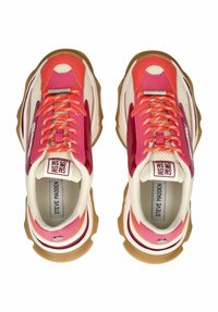 Sneakers featuring pink and white mesh with glossy accents, chunky gum sole, and contrasting laces, labeled "Steve Madden" inside.