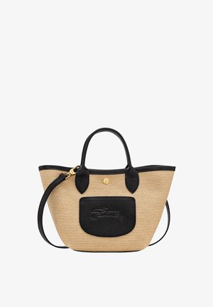 Woven straw handbag with black leather accents and a front pocket. Features short handles and a removable shoulder strap.
