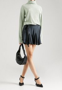 Guido Maria Kretschmer Collection Stickad tröja - green