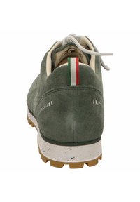 Green suede sneaker with a white and textured rubber sole. Features a striped Italian flag accent on the heel and light gray laces.