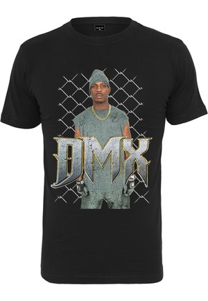 T-shirt en coton noir avec un graphique d'un homme en tenue grise portant un bonnet, sur fond de clôture en mailles. "DMX" affiché en évidence.