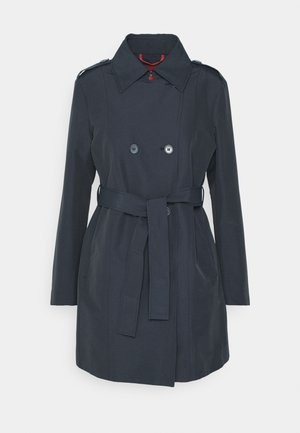 Navy blue trench coat in lightweight fabric featuring a double-breasted design, belted waist, and shoulder epaulets.