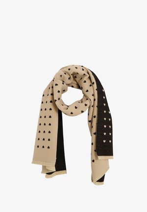 Écharpe beige et noire avec des motifs en forme de cœur, dotée d'une surface texturée, finie par des bords frangés et un côté sombre contrastant.