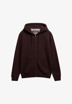 Sudadera con cremallera en color burdeos, fabricada en un tejido suave. Presenta una cremallera frontal, dos bolsillos laterales, capucha con cordón y un pequeño logo en el pecho.