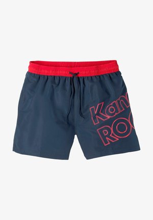 Navy swim shorts with a red elastic waistband and drawstring. Features large red text "Kangaroo" on the front left side. Smooth texture.