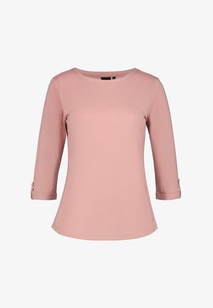 Rosa Damenoberteil mit Dreiviertelärmeln. Weiches Baumwollmaterial, runder Halsausschnitt und Rolltab-Akzente an den Ärmeln. Glatte Textur.