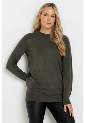 Olive green long-sleeve sweater with a round neck, ribbed cuffs, and hem. Made from soft, lightweight fabric. Worn with black leather pants.