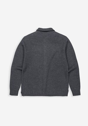 Donkergrijze wollen cardigan met een zachte textuur, lange mouwen en een kraag. Heeft zijsplitten aan de zoom voor extra bewegingsvrijheid.