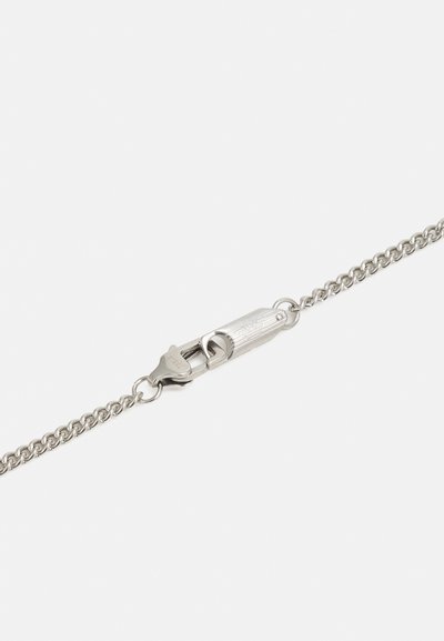 Silver metal chain necklace featuring a textured clasp with engraved detailing. Links are small and evenly spaced, creating a delicate appearance.
