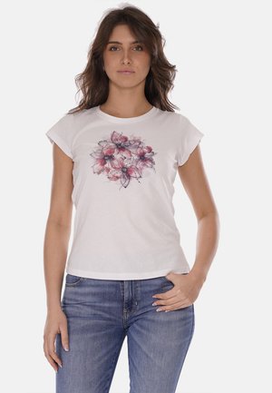 T-shirt bianco a maniche corte con un design floreale in rosa e viola. Realizzato in morbido cotone con una vestibilità comoda e scollo rotondo.