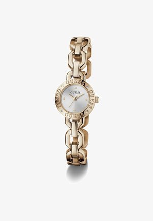 Orologio tono oro con quadrante rotondo, quadrante argento e bracciale a maglie. Presenta il nome del marchio inciso e dettagli in cristallo sulla lunetta.