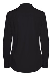 Fekete hosszú ujjú ing galléros nyakkal, gombos mandzsettával és ívelt szegéllyel. Az anyag simának tűnik, látható minták vagy díszítések nélkül.