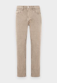 Μπεζ τζιν από τζιν ύφασμα με ίσια γραμμή, διαθέτουν πέντε τσέπες, κλείσιμο με μεταλλικό κουμπί και διακριτική ξεθωριασμένη υφή. Κλασικό στυλ, χωρίς διακοσμητικά στοιχεία.