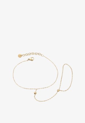 Złota bransoletka łańcuszkowa z zapięciem, regulowaną długością oraz małymi okrągłymi koralikami na łańcuszku dla dodatkowego efektu.