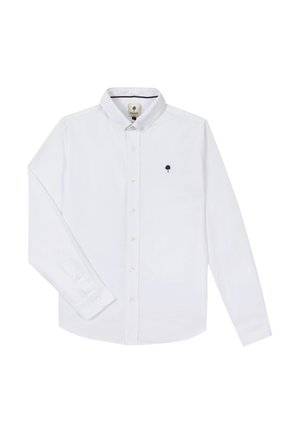 Chemise blanche à manches longues avec boutons, col boutonné et petit logo sombre en forme d'arbre sur la poitrine gauche.