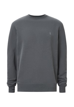 Szary sweter z okrągłym dekoltem, wykonany z miękkiego materiału. Oferuje długie rękawy oraz ściągacze. Mały detal z logo z przodu. Gładka tekstura.