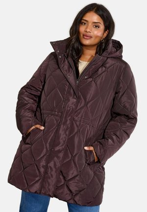Tumman violetin värinen tilkkupintainen puffer-takki hupulla, jossa on vetoketjukiinnitys, kaksi sivutaskua ja kapeampi vyötärö. Sileä, kiiltävä pinta.