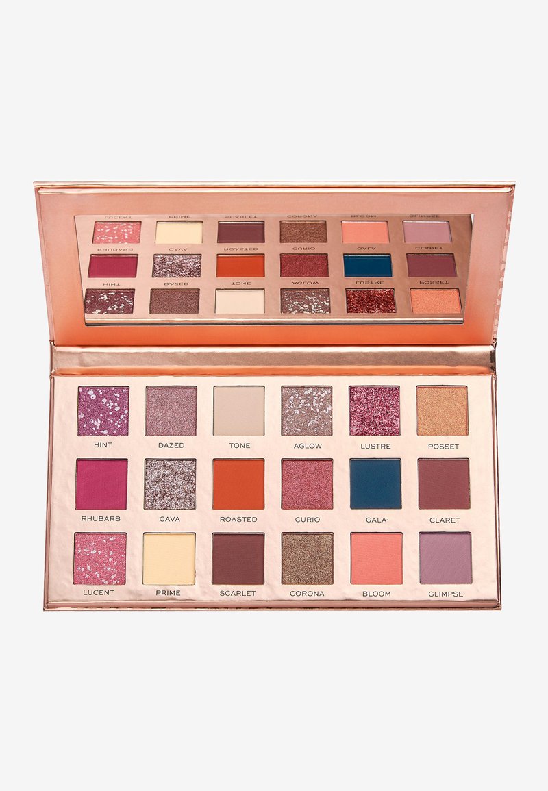 Øjenskyggepalette med 15 kvadrater i forskellige nuancer, herunder pink, lilla og neutrale farver. Indeholder matte og glitterfinish. Emballage i roséguld.
