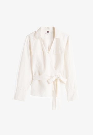 Biely ľanový obliečkový top s dlhými rukávmi, dvoma prednými vreckami, pásom na viazanie v páse a golierom.