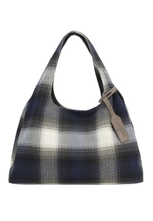 Blue, black, and white plaid fabric handbag with wide strap and attached gray leather tag on a white background.