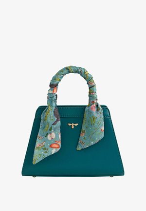 Mėtos spalvos odinė rankinė su struktūrizuotu dizainu, pintas šalikėlio rankenos su botaniniu raštu ir auksiniu bitės emblemų priekyje.