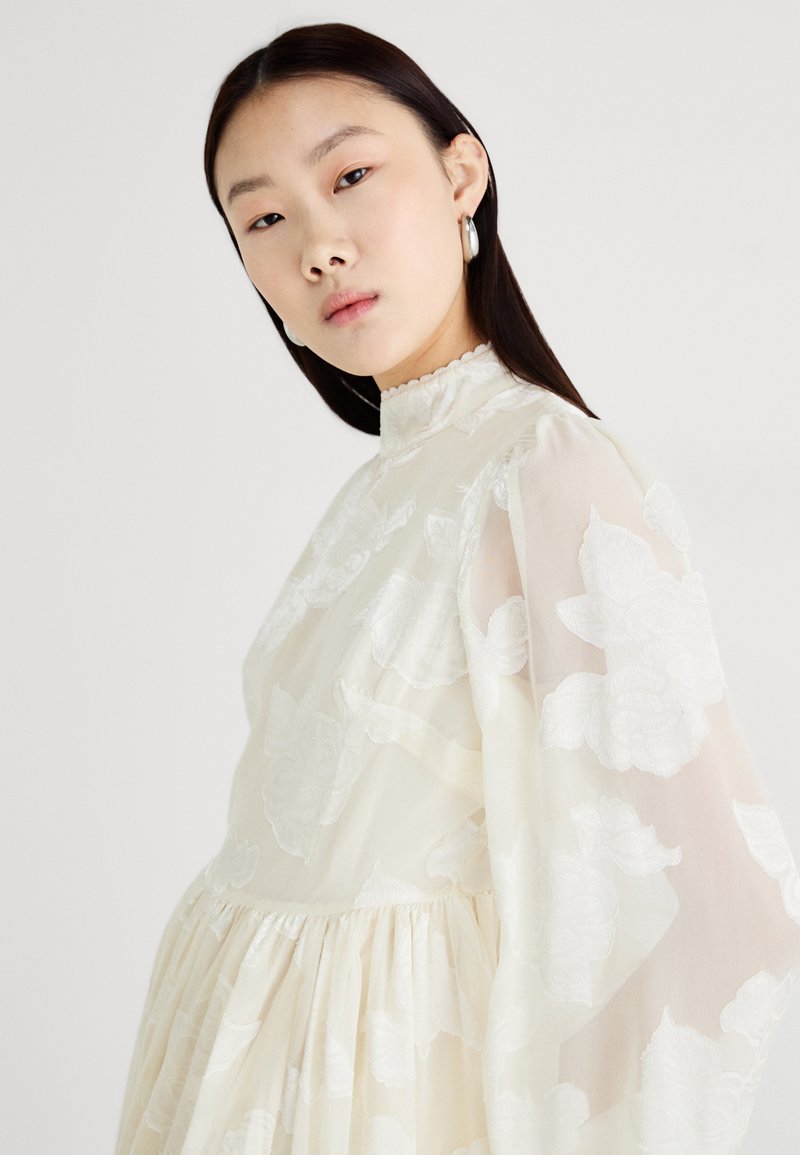 sister jane cream dress Sister Jane Pony Cream Sheer Pintuck Lace Long Sleeve Collared Midi Dress in Natural