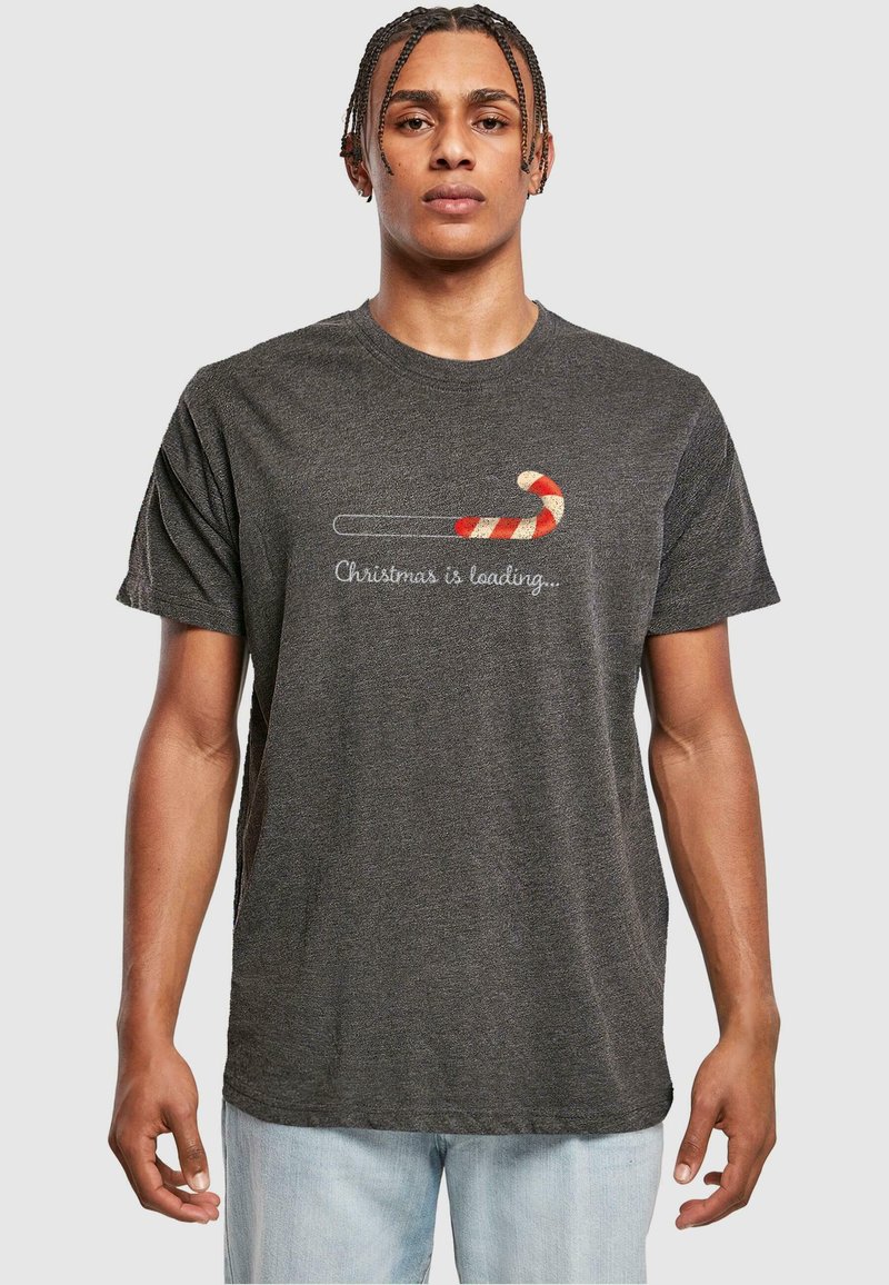 Gray short-sleeve T-shirt featuring a candy cane graphic and the text "Christmas is loading..." in white, smooth cotton blend fabric.