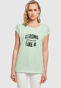 Merchcode STRONG LIKE A WOMAN EXTENDED SHOULD - T-shirts med print - neo mint
