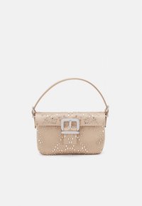 Beige leather handbag with a rounded shape, featuring a front flap and a silver buckle closure. Embellished with metallic accents and perforations.