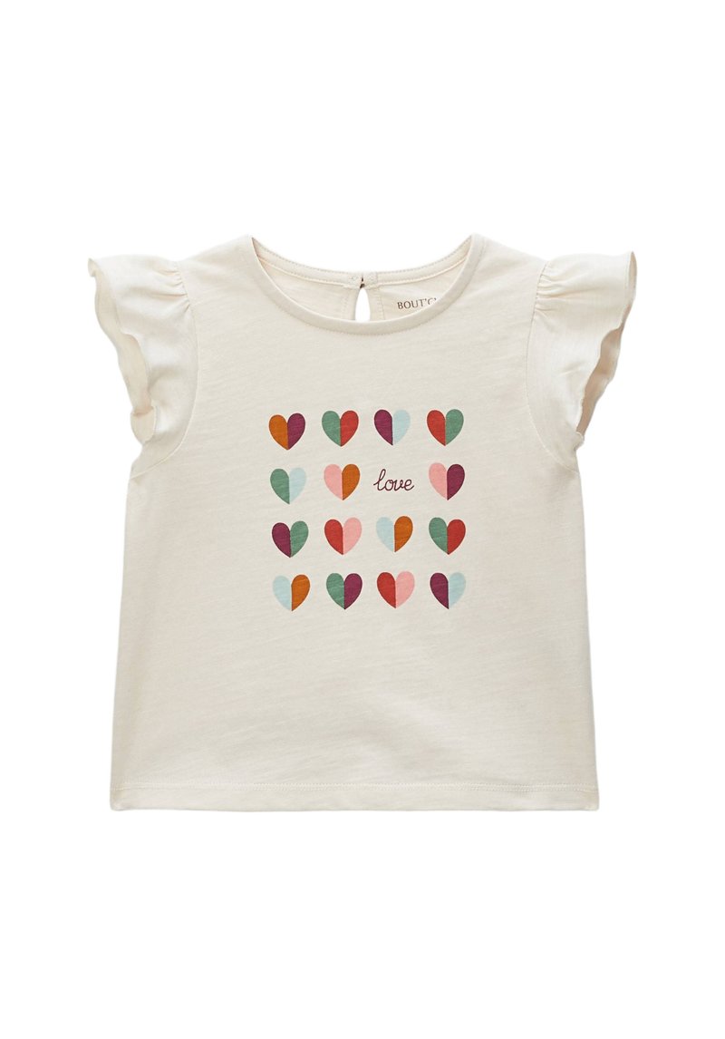 T-shirt crème à manches courtes avec épaules volantées, arborant un motif de cœurs multicolores et le mot « love » au centre.
