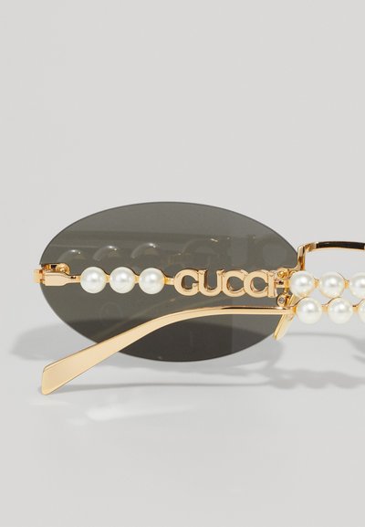 Gucci Sluneční brýle - gold-coloured/grey