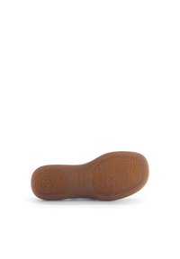 Brown rubber sole with a textured pattern and embossed logo. The shape is contoured with a slight arch for support.