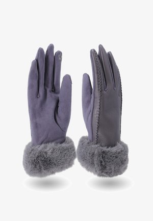 Un paio di guanti invernali viola con polsi in pelliccia sintetica, palmi in suede testurizzato e retro in pelle con cuciture decorative.
