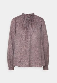 Blouse à manches longues en tissu léger avec un col montant volanté, arborant un motif à pois multicolores sur fond sombre.