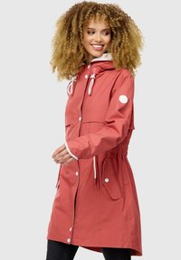 Red waterproof jacket with a hood, white accents, elastic waist, and snap-button closures, featuring two front pockets and a relaxed fit.