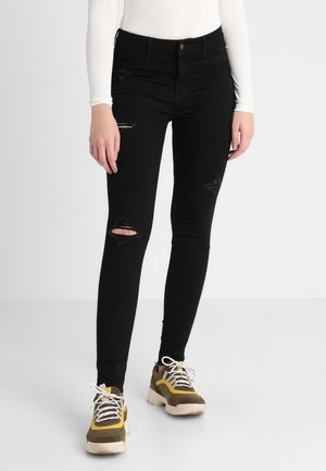 Vaqueros pitillo - black denim