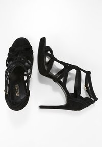 MICHAEL Michael Kors Korolliset sandaalit - black