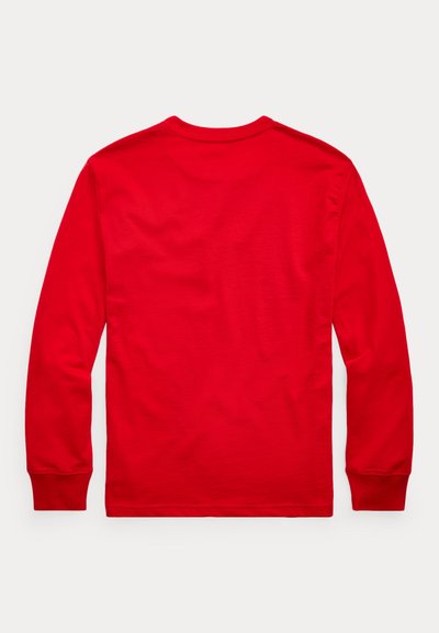 Red long-sleeve crew neck shirt laid flat, showing back side, with ribbed cuffs and hem on plain white background.
