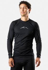 Schwarzes Langarm-Thermoshirt mit geripptem Textur und einem weißen Berggrafik auf der Brust. Hergestellt aus einem enganliegenden, dehnbaren Material.