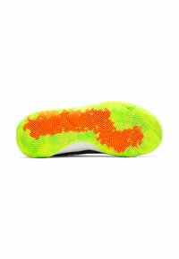 Shoe sole featuring a vibrant design with green, yellow, and red interlocking patterns; textured surface for grip and stability.