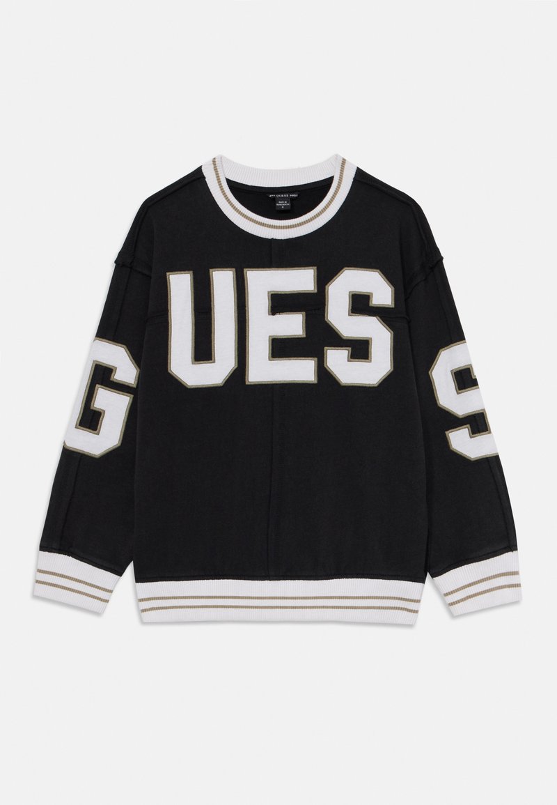 Sudadera negra con texto "GUESS" en blanco y dorado, de mangas largas, y puños y dobladillo de canalé blancos con rayas doradas. Material de algodón.