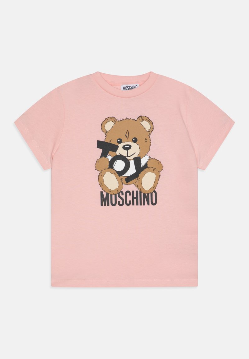 Rosa bomull t-skjorte med et brunt tegneserie-bjørn grafikk med teksten "Toy" og "Moschino" i svart. Korte ermer og rund hals.