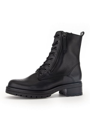 Black leather ankle boot with a lace-up front, side zipper, chunky sole, and a slightly raised heel for added support and stability.