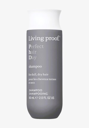 Flacone di shampoo Living Proof Perfect Hair Day per capelli spenti e secchi, 60 ml, con etichetta grigia e tappo a scatto bianco.