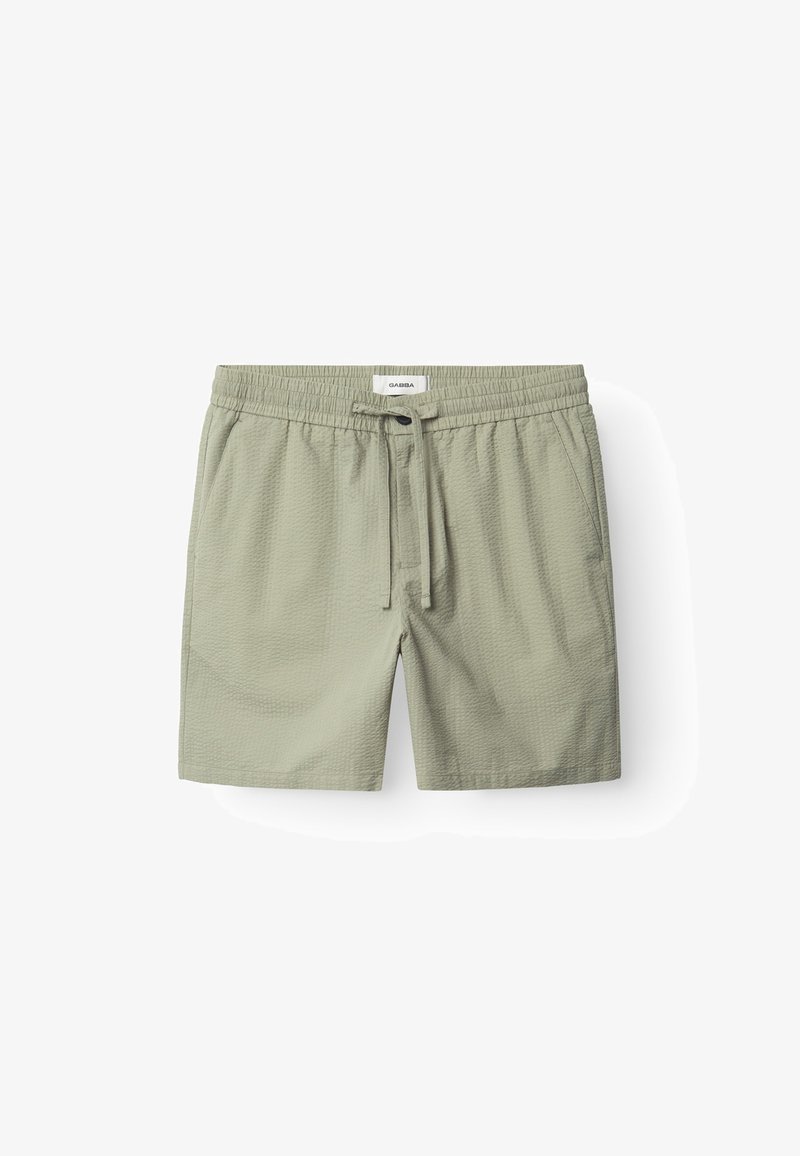 Šviesiai žali maudymosi šortai iš tekstūruotos medžiagos su elastinga juosmens juosta, reguliuojamu raišteliu ir šoninėmis kišenėmis.
