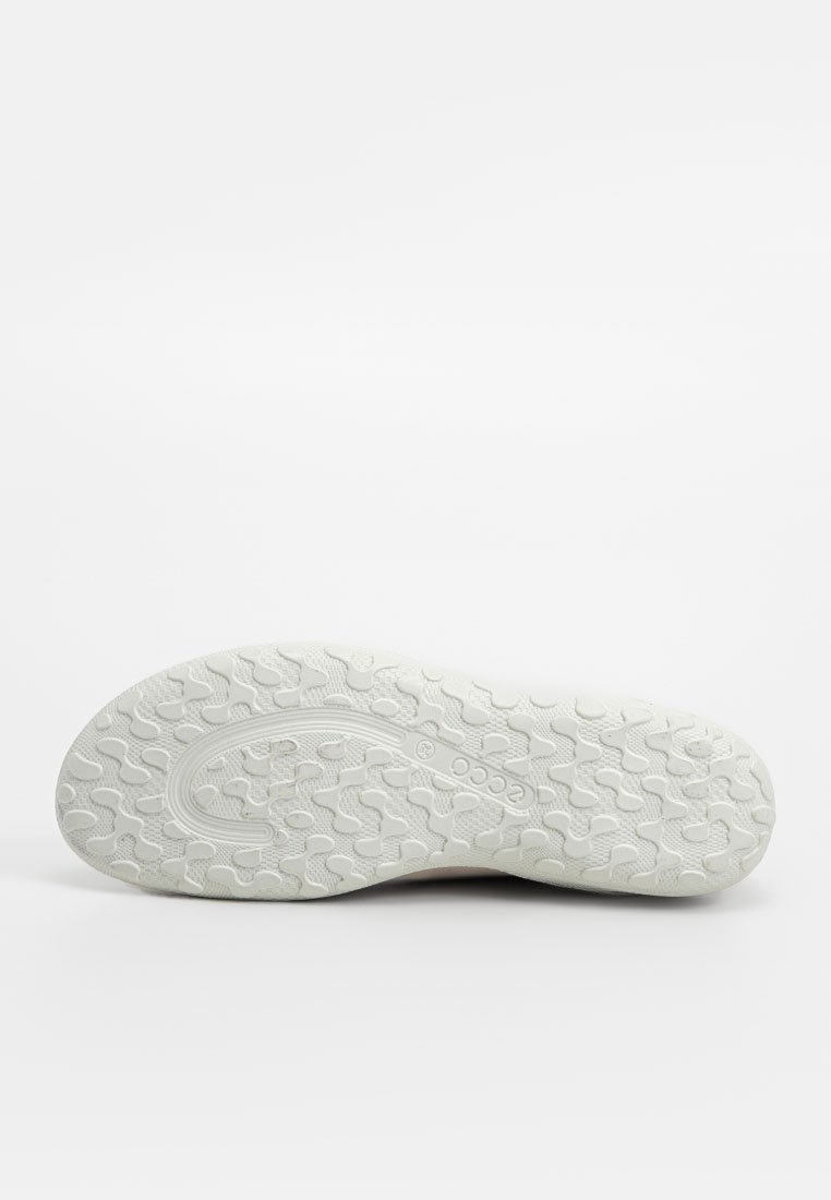 Biała gumowa podeszwa o teksturowanej powierzchni z falistym wzorem, z logo na środku i wypukłymi węzłami dla lepszej przyczepności.