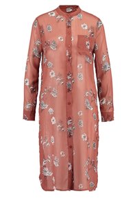 Long, button-up shirt in a sheer, rust-colored fabric with floral print. Features a collar, long sleeves, and a chest pocket.