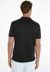 Calvin Klein Jeans INSTITUTIONAL - Polo - schwarz